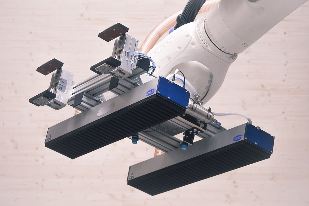 BUGA Wood Pavilion: Robot end effector handling a timber segment