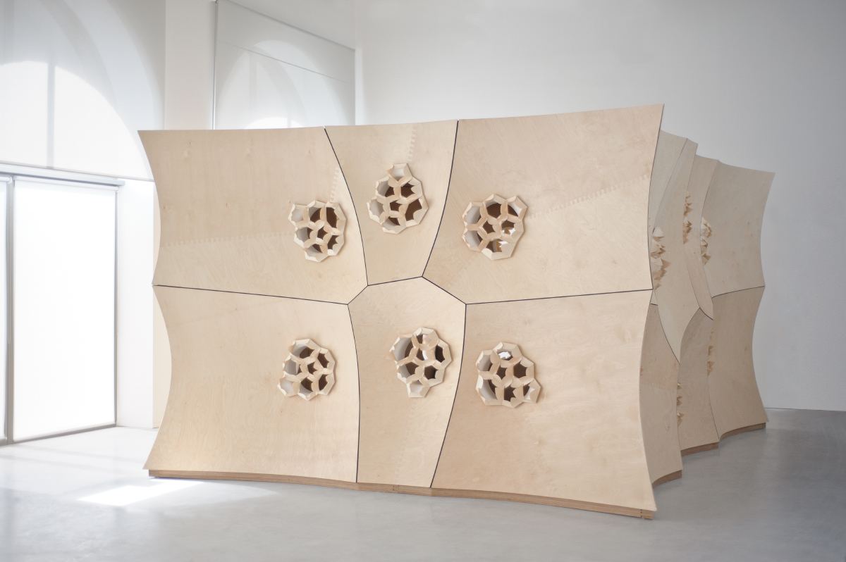 HygroSkin: Meteorosensitive Pavilion: Wooden skin modules with apertures