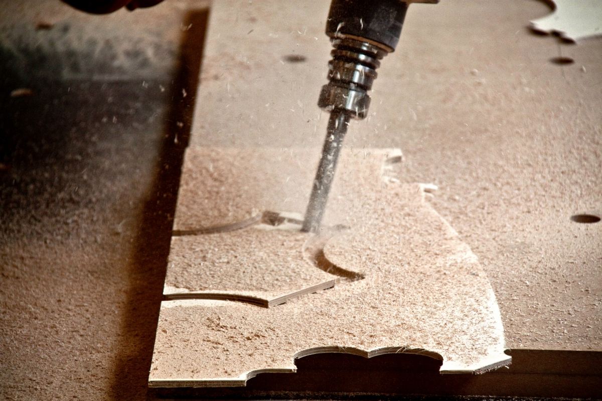 Robotically Manufactured Material Systems: Milled plywood part on the robot table